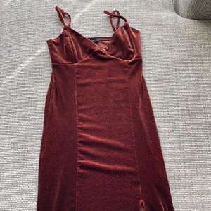 This dress is very cute, tightly fitted.